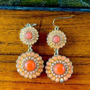 Gold tone and coral dangle earrings